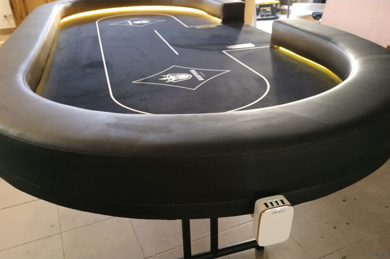 A poker table made by Fama Game Tables